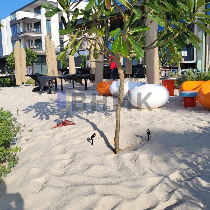 Beach lounge landscaping with white silica sand