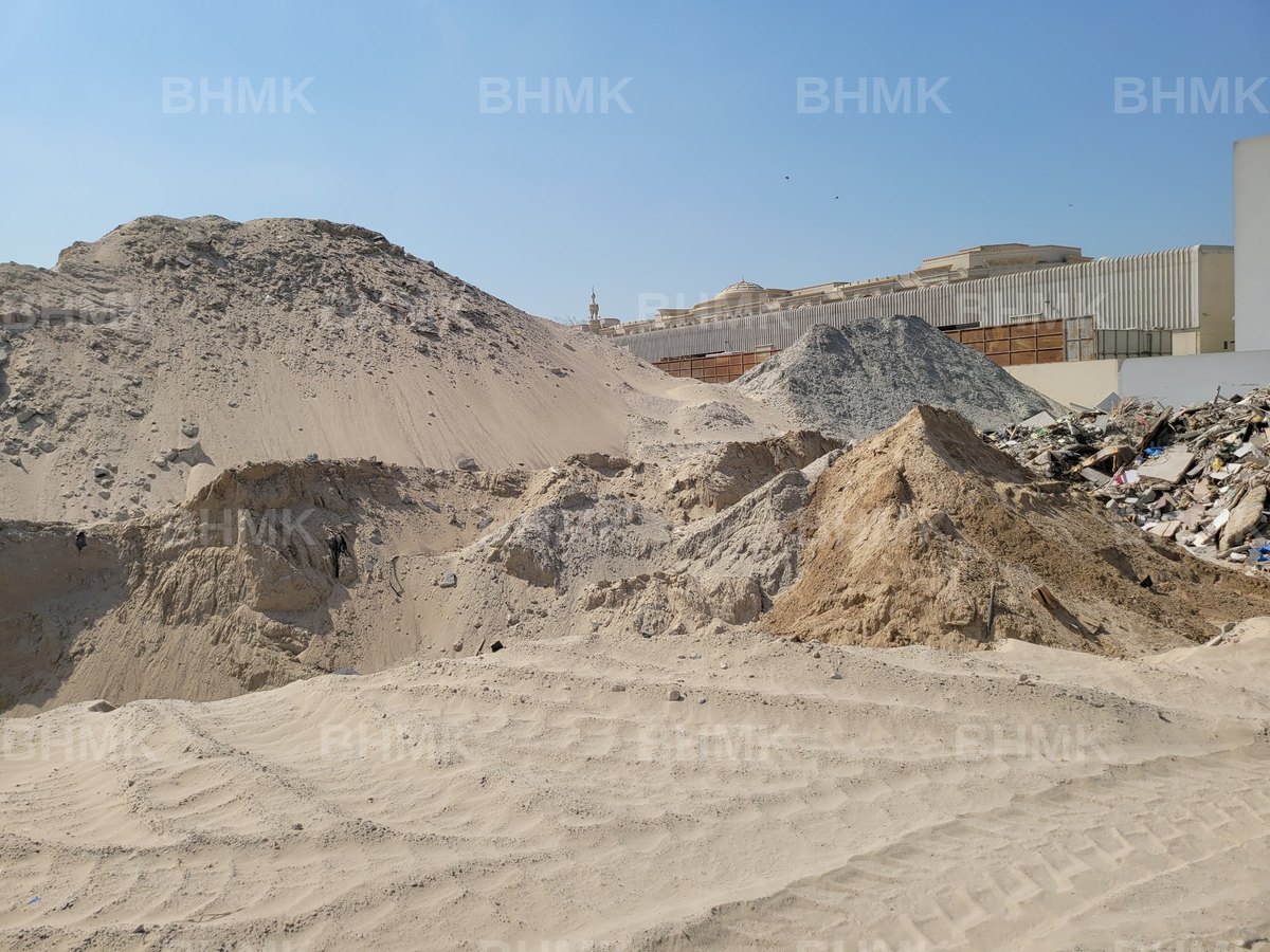 Backfilling sand stockpiles at the BHMK yard in Dubai