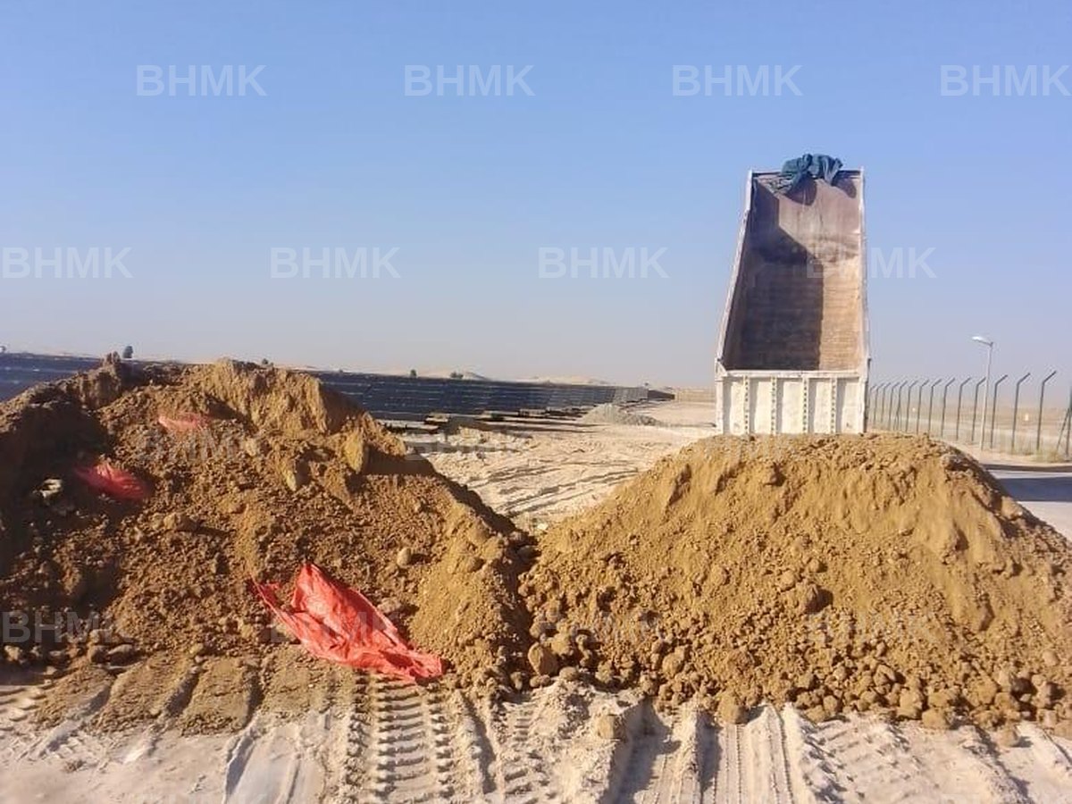 BHMK tipper discharging backfilling sand on a Dubai site